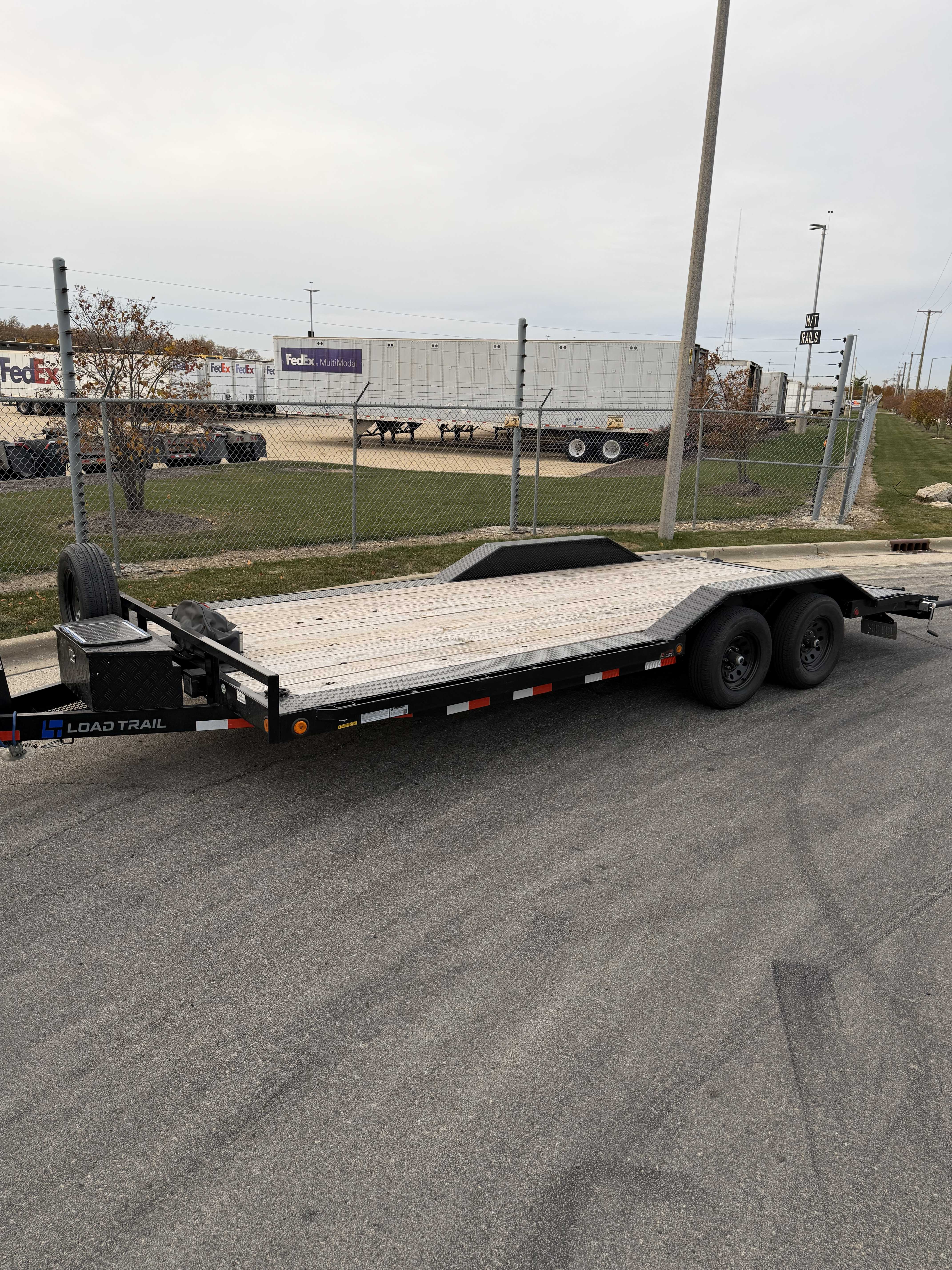 Flatbed utility trailer rental available in Joliet IL for equipment and material hauling
